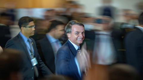 El presidente de Brasil, Jair Bolsonaro, participa hoy en la ceremonia de posesión del nuevo Ministro de Defensa, el general Fernando Azevedo e Silva, en Brasilia (Brasil). Bolsonaro honró hoy al nuevo ministro de Defensa, el general Fernan