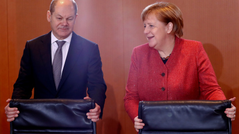 German Chancellor Angela Merkel and Finance Minister Olaf Scholz attend the weekly cabinet meeting in Berlin, Germany, December 12, 2018. REUTERS/Fabrizio Bensch