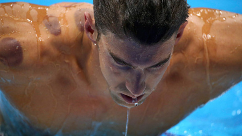 Michael Phelps, durante la eliminatoria de los 200 mariposa en los Juegos Olímpicos. REUTERS/Michael Dalder