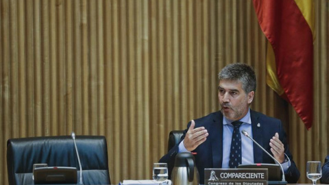 El director general de la Policía, Ignacio Cosidó, durante su intervención ante la Comisión de Presupuestos del Congreso para informar de las cuentas de su departamento para el próximo año. EFE