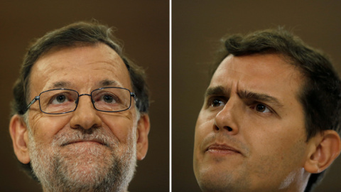 El presidente del Gobierno en funciones, Mariano Rajoy, y el líder de Ciudadanos, Albert Rivera, durante sus respectivas comparecencias ante los periodistas tras su reunión en el Congreso de los Diputados. REUTERS/Susana Vera