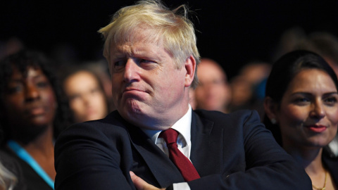 El primer ministro británico, Boris Johnson, acude al congreso anual del Partido Conservador en Manchester (Reino Unido), este lunes. EFE/ Neil Hall