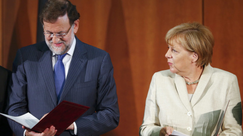 El presidente del Gobierno, mariano Rajoy, junto a al canciller alemana, Angela Merkel, en un encuentro en BerlÍn.- REUTERS