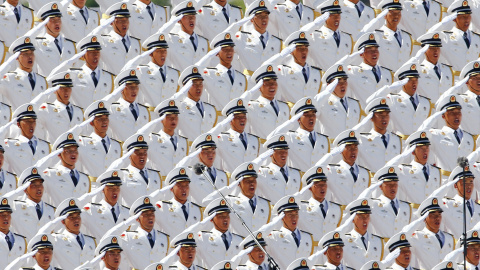 Miembros de la banda militar del Ejército chino cantan durante el desfile en Pekín comemorativo del final de la II Guerra Mundial. REUTERS/Damir Sagolj