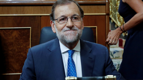 El presidente del Gobierno en funciones, Mariano Rajoy, tras su llegada al Congreso de los Diputados para la sesión de investidura. REUTERS/Juan Medina