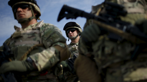 Servicemen attend a farewell ceremony at the Vaziani military base outside Tbilisi, Georgia, September 30, 2015. According to Georgia's Defence Ministry, the servicemen, comprised of members of the 22nd battalion from the II infantry brigad