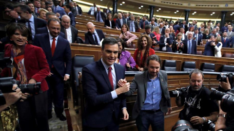 Pedro Sánchez y Pablo Iglesias durante la investidura del presidente socialista. -  EFE/Juan Carlos Hidalgo