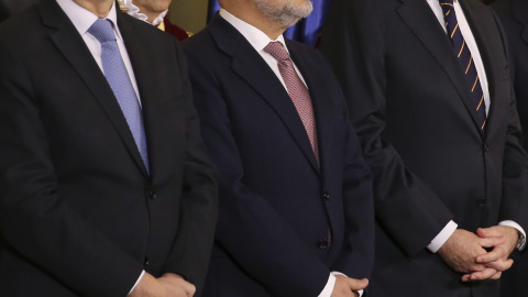 El presidente del Gobierno y candidato del PP a la reelección, Mariano Rajoy, el presidente del Tribunal Supremo y del CGPJ, Carlos Lesmes, y el presidente del Tribunal Constitucional, Francisco Pérez de los Cobos, durante la recepción cele