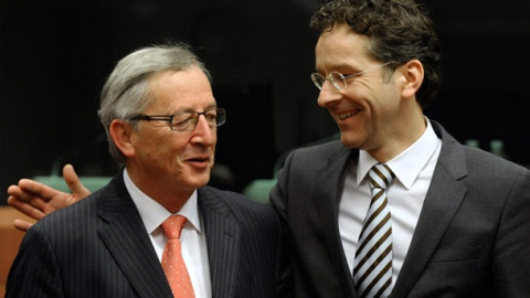 Jean-Claude Juncker y Jeroen Dijsselbloem, quien sucedió al primero al frente del Eurogrupo.