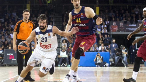 Llull y Tomic, durante el partido. EFE/Quique García