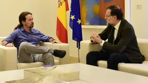 Rajoy junto a Pablo Iglesias en la única reunión que han mantenido en La Moncloa. /EFE