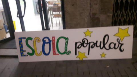 El cartell de l'Escola  Popular de Manresa. / ESCOLA POPULAR