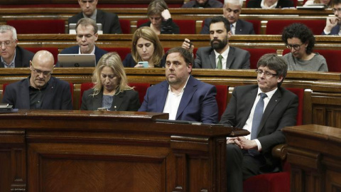 Carles Puigdemont i Oriol Junqueras en el debat de pressupostos. EFE