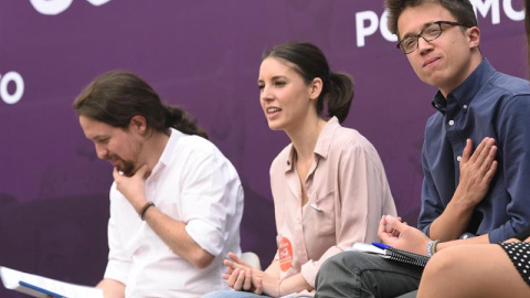 Pablo Iglesias, Irene Montero, e Íñigo Errejón, durante el acto "Madrid se levanta". EFE/Fernando Villar