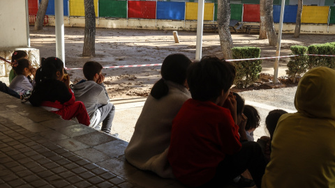 niños regresan al colegio