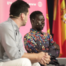 Thimbo Samb (derecha) y Álvaro Hernández en el Congreso Internacional de Periodismo de Migraciones (Mérida). Foto: Pablo Fernández.