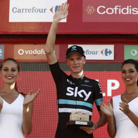 Froome, también acompañado en un podio /EFE