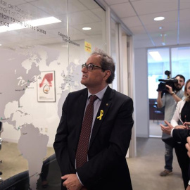 27/06/2018.- El presidente de la Generalitat de Cataluña, Quim Torra (c), visita las instalaciones de ACCIÓ, la oficina comercial del gobierno regional catalán, hoy, miércoles 27 de junio de 2018, en Washington, DC (EE.UU.). Torra calificó hoy de "in