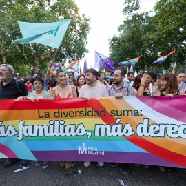 Varias personas con una pancarta durante la manifestación del Orgullo LGTBI+ 2023, a 1 de julio de 2023, en Madrid.