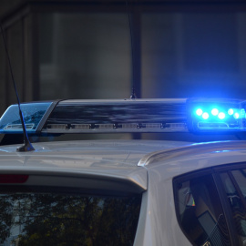 Sirena de un coche de policía.