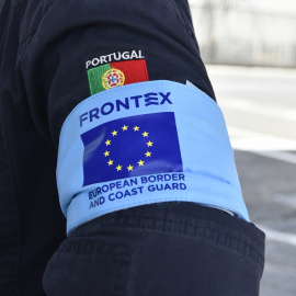 Plano del brazo de un policía de FRONTEX, en un acto en Ceuta, en una imagen de archivo. E.P./Antonio Sempere