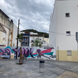 Dibujo en un muro de Málaga, en el barrio de Las Lagunillas, en defensa de La Invisible.