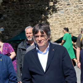 Carles Puigdemont arribant aquest divendres a Cotlliure acompanyat de Jordi Turull i Josep Rius.