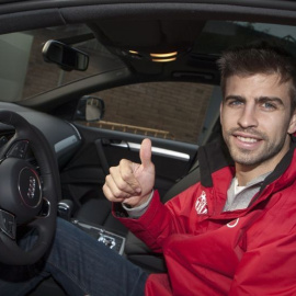 Gerard Piqué, al volante de un coche Audi en un acto publicitario con el Barcelona.