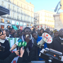 Cheikh Ndiaye, presidente de la Asociación de Inmigrantes Senegaleses en España (AISE) en la manifestación celebrada el 21 de marzo de 2018 en Madrid