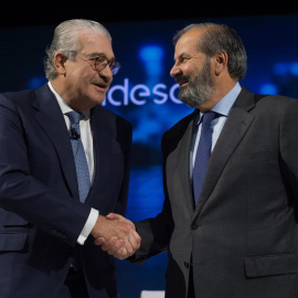 El presidente de Endesa, Juan Sánchez-Calero (d), y el consejero delegado, José Bogas (i), en la junta de accionistas de la eléctrica. E.P.