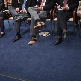  Un grupo de reporteros toman notas durante una conferencia de prensa en Washington DC.- AFP