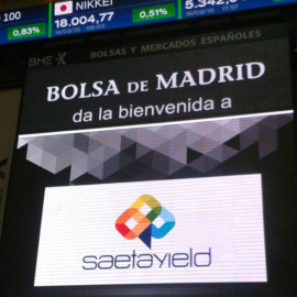 Panel informativo del estreno en bolsa de Saeta Yield en la Bolsa de Madrid. EFE