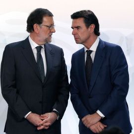 José Manuel Soria junto a Mariano Rajoy durante el acto en Ifema esta semana. EFE