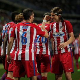 Koke y Filipe Luis celebran la victoria ante el Málaga.- REUTERS